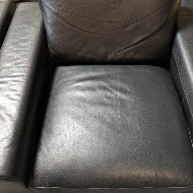 Seat after restoration, rebuilt with new padding and a fresh cover